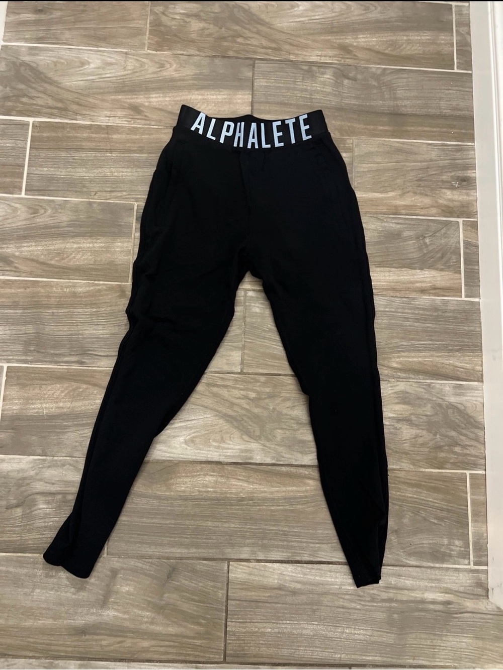 Alphalete Black Leggings with White Logo Waistband